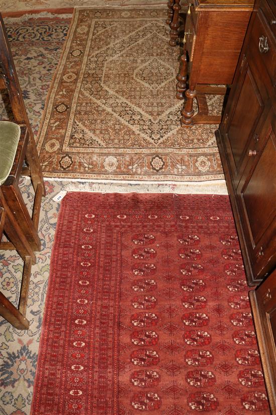 Small Bokhara rug and another rug